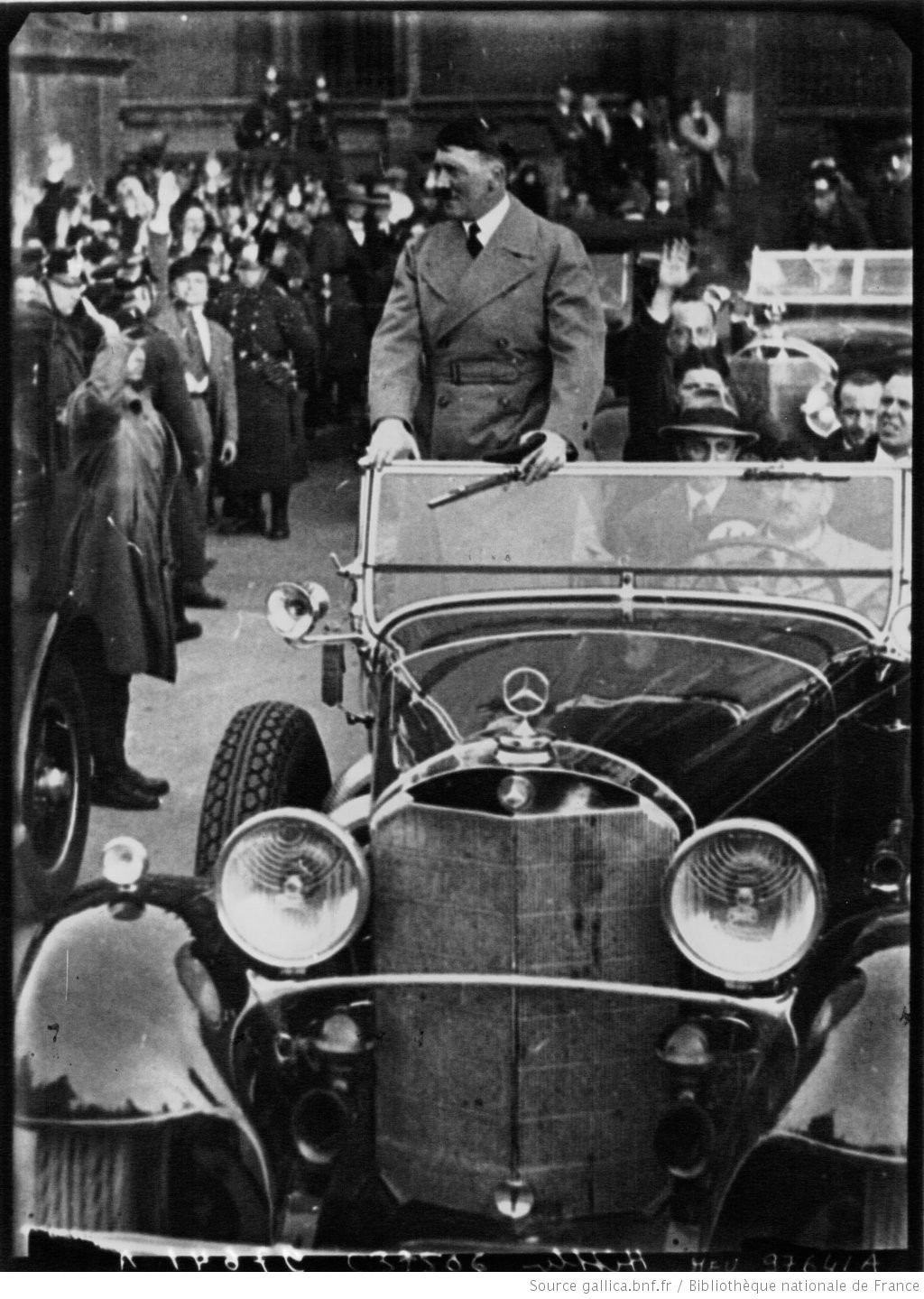 Adolf Hitler on his way to the Siemens factory to deliver a speech